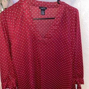 Juniors red blouse with white polka dots